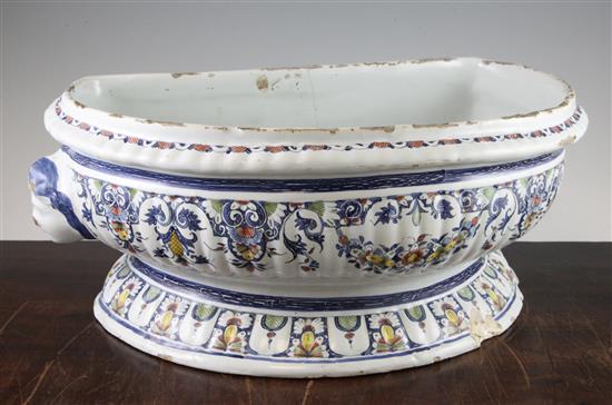 A Rouen faience pottery cistern, c.1720-1740, 53cm, restored